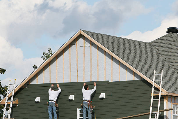 Professional Siding Replacement technician working in River Grove, IL